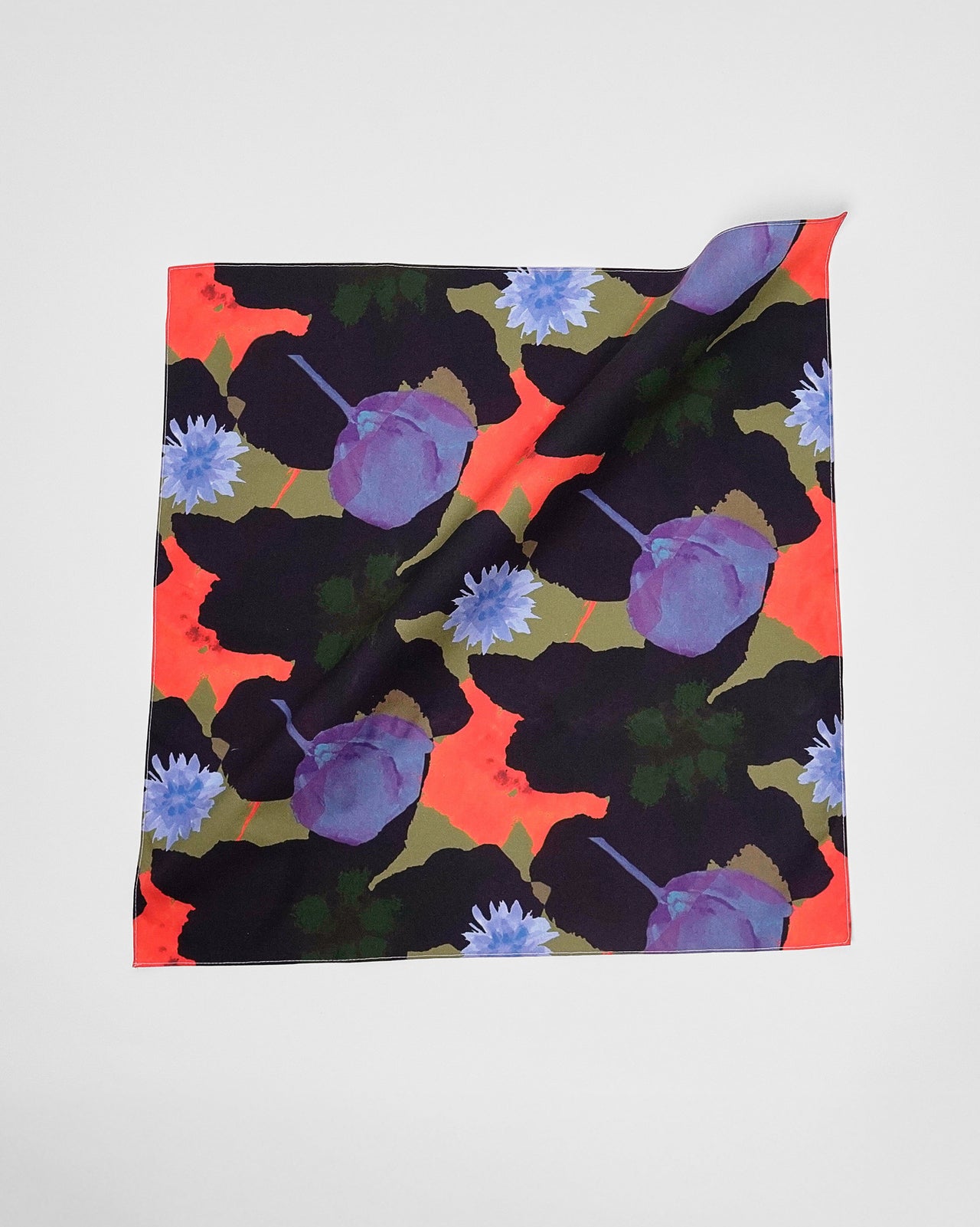 Colorful floral patterned fabric on a white background